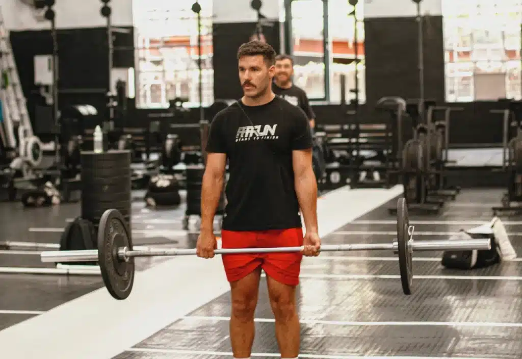 CrossFit athletes testing their strength with squats and deadlifts during Test Week.